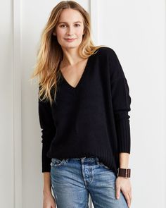 The one that started it all. One of our very first sweaters and still our best seller. Ella is an effortless, easy to wear V-neck sweater with a boxy, boyfriend fit. This medium weight sweater is crafted from the finest 100% cashmere yarns and knitted tightly for luxurious drape and long lasting durability. Ella is designed for an over sized look. If you prefer a more classic fit, size down one size. Models wear size small. Click for sizing details Available in Otter, Charcoal, Cloud, Ivory, Bla Pretty Sweaters, Cashmere Yarn, Classic Wardrobe, Fall Fits, Over Sized, Favorite Sweater, Boyfriend Fit, V Neck Sweater, Women Pullover