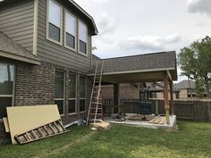 a house that has been boarded up and is in the process of being remodeled