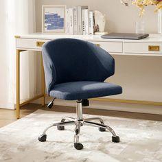 a blue office chair sitting on top of a white rug