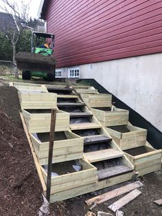 the steps are made out of wood and ready to be built into the house's foundation