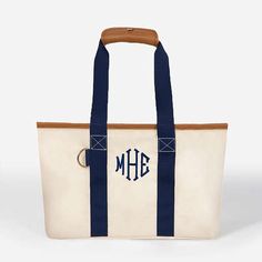 This Personalized Market Tote makes the perfect tote for everyday errands, tailgates, and all your spring adventures! It is lightweight, spacious, and is easily collapsable for easy traveling and storage. Looking for more personalized gifts? Check out our wide variety of monogrammed products including bridal party gifts to graduation gifts!Open Top, No ClosureMeasures 8.5" deep at Base and 12" at Opening, 18.5" Wide, and 11.5" tall. 12 Inch Drop HandlesCollapsibleMade of Polyester CanvasFeatures Spring Picnic, Marley Lilly, Market Basket, Market Baskets, Market Tote, Bridal Party Gifts, Personal Marketing, Open Top, Gift Giving