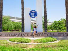 a woman posing in front of the california state university fulltone