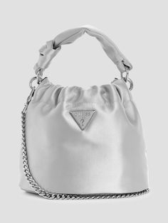 Satin mini pouch bag Shiny silver-tone hardware Enamel signature emblem Mini bucket silhouette Single-compartment construction Drawstring closure Twisted top handle with 3.5" drop. Crossbody strap with 19" drop. 7.5"W x 6"H x 5.5"D Silver Bucket Bag With Silver-tone Hardware For Formal Events, Formal Silver Bucket Bag With Silver-tone Hardware, Silver Bucket Bag With Silver-tone Hardware For Everyday Use, Silver Bucket Bag With Silver-tone Hardware For Evening, Modern Silver Bag With Top Carry Handle, Luxury Silver Bucket Bag With Silver-tone Hardware, Elegant Silver Bucket Bag With Silver-tone Hardware, Silver Bucket Bag With Silver-tone Hardware, Chic Silver Bucket Bag With Silver-tone Hardware