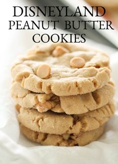 three peanut butter cookies stacked on top of each other with the words, disneyland and peanut butter cookies