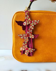 "Just have a look at this cute leather bag decor. I made this Unique Bag Charm from high quality Turkish leather. Then it was hand-painted and decorated with sparkling small crystrals. Please Note thare are two variant charms. The bigger is included 10 butterflies and the smaller is 6 butterflies. Measurements of butterflies: Width approximately 2.5 inches (6 cm). Height approximately 1.8 inches (4,5 cm). Measurements of charm with 10 butterflies: Height approximately 9 inches (23 cm). Measureme Leather Bag Charm With Interior Key Chain For Travel, Pink Shoulder Bag With Detachable Handle As Gift, Handmade Red Bags Fashion Accessory, Pink Bag With Detachable Strap As Gift, Gift Shoulder Bag With Detachable Handle, Red Satchel With Detachable Handle For Gift, Red Satchel With Detachable Handle As Gift, Red Satchel With Detachable Strap As Gift, Pink Satchel With Adjustable Strap As A Gift