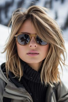 A layered lob is a hassle-free and fashionable hairstyle choice for the slopes. Its length is easy to manage while the layers add a modern touch, making it a great option for snowboarders who value style and convenience. Click to see more. Lob Outfits, Fine Hair Lob Shoulder Length, Blond Shag Hairstyles, Honey Blonde Long Bob, Trending Bobs 2024, Hair Styles With Glasses, Light Brown Lob, Modern Lob Haircut, 2025 Haircuts For Women