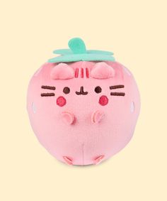 Front view of the Pusheen Fruits Strawberry Squisheen Plush. The light pink plush stands 4” tall and has Pusheen the Cat’s facial features embroidered on the front of the rounded form in dark brown and dark pink. Pusheen is blushing and smiling. Coming off the top of the plush is a light green stem and leaf felt piece. Werewolf Oc, Pusheen Stuff, Cute Plush Toys, Car Decor Ideas, Nature Stickers, Rosy Cheeks