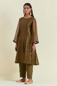 Green A-line kurta crafted in shimmer organza with side pocket. Paired with a pant and a tassel hand embroidered hem dupatta. - Aza Fashions Festive Cotton Silk Tunic Kurta, Elegant Semi-stitched Straight Kurta Blouse Piece, Navratri Tissue Silk Straight Kurta, Gold Long Sleeve Slub Silk Kurta, Elegant Zari Work Straight Kurta Blouse Piece, Elegant Straight Kurta Blouse Piece With Zari Work, Fitted Tissue Silk Kurta With Gota Work, Fitted Cotton Silk Kurta For Reception, Tissue Silk Kurta With Sheer Dupatta