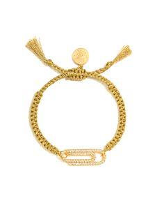 Adding a bit of glam to the everyday paper clip, our Hold It Together Bracelet adds a touch of bling to your wardrobe. Sparkly little rhinestones and a thin gold thread keep it all together in style! 6" Adjustable gold threadwork Drawstring closure (extendable up to 8") Gold plated brass hardware Pave rhinestone charm Handmade in New York City and Puerto Rico. Due to the handmade nature of our products, some charms may vary in color and style or be replaced if unavailable. Please allow 5-7 busin Wrist Jewelry, Hair Rings, Gold Thread, Gold Threads, Bracelet Gold, Dream Clothes, Brass Hardware, Paper Clip, Ring Bracelet