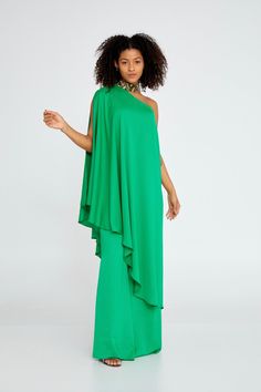 (SALE ITEM - FINAL SALE) Celebrate in style in this kaftan jumpsuit, the Solange kaftan jumpsuit is perfect to feel free and relaxed while still looking stylish and elegant. Made from a lightweight and breathable fabric, this jumpsuit features a loose and flowy design that will make you feel like you're walking on air. Perfect for receptions, wedding guests, and other special occasions. This flowy kaftan jumpsuit is a must-have for any fashion-forward wardrobe. Features: Beaded color Side zipper Kaftan Jumpsuit, Side Cape, Green Kaftan, Cape Jumpsuit, Morgan Dress, Flowy Design, The Morgan, Shipping Tags, Sophisticated Dress