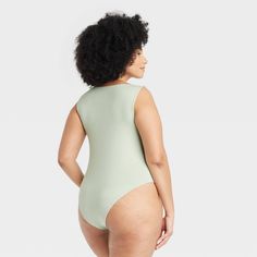 Elevate your dressing style with this Slim-Fit Boat Neck Bodysuit from A New Day™. This solid-color sleeveless bodysuit features a simple boat neck and a slim-fit silhouette. Made from thick jersey fabric with added stretch, it provides a comfortable and flexible fit, and the adjustable crotch snaps make for easy, customized wear. You can coordinate it with different bottoms and match with layering pieces to create a range of versatile styles. A New Day™: Style that goes wherever you do. Sleeveless Second-skin Green Bodysuit, Sleeveless Green Second-skin Bodysuit, Sleeveless Tight-fitting Green Bodysuit, Simple Boat, Dressing Style, Sleeveless Bodysuit, Womens Clothing Sizes, Layering Pieces, A New Day