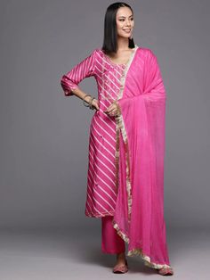 Pink Cotton Leheriya Print & Embroidered Suit Set with Silk Chiffon Dupatta Spring Festive Salwar Kameez With Gota Work, Spring Salwar Kameez With Gota Work And Long Sleeves, Spring Long Sleeve Salwar Kameez With Gota Work, Bollywood Style Kurta With Gota Work For Spring, Bollywood Style Palazzo Set With Gota Work For Spring, Spring Semi-stitched Salwar Kameez With Gota Work, Semi-stitched Salwar Kameez With Gota Work For Spring, Spring Straight Kurta Set With Gota Work, Spring Sets With Gota Work And Straight Kurta