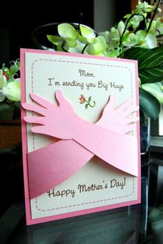 a pink card with the words happy mother's day on it