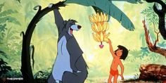 the jungle book character is holding up a banana to another person in front of him