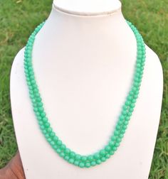 Natural Chrysoprase Gemstone Beads Round Shape 16 Inch 1 Strand Size 4-6 mm Approx Briolettes Beaded Genuine Chrysoprase Smooth Necklace Gemstone = AAA Natural Chrysoprase Size = 4-6 mm Approx Shape = Round Smooth Lock = Silver Lock 925 Length = 16 Inch  Quantity =  1 Strand  Bulk wholesale pricing is available convo me for information on this listing or any others in my shop. We are continuously adding new products in our store. So keep coming back to see more great deals. CLICK BELOW TO CHECK ALL OUR BEAUTIFUL RONDELLES https://www.etsy.com/in-en/shop/JaipurGemsBeadsCo?ref=search_shop_redirect Have questions? Please contact us via messaging option. We will resolve your query within maximum 24 hours. Private Assistance : If you still need any clarification on the product offer, You can pl 16 Inch Necklace, Lock Necklace, Necklace Gemstone, Necklace Online, Strand Necklace, Faceted Bead, Photo Jewelry, Fire Opal, Little Gifts