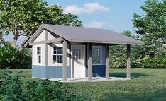 a small blue and white shed in the middle of a field with trees around it