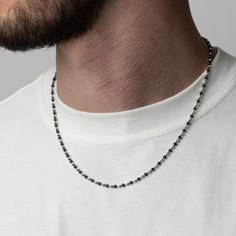 "3mm Italian made 925 Sterling Silver Moon Cut Bead Chain plated with Rhodium Two tone Chain Black & silver :)  Adjustable extender perfect for men and woman sizes. DETAILS Thickness: 3MM Weight:  3MM: 18\": 9.3g / 20\" 10.4g Closure: Stamped Lobster Clasp Materials: Italian 925 Sterling Silver Adjustable 5cm's included Link Style: Moon Cut Bead Chain Packed in a Twistedpendant Jewellery Pouch SIZING This chain is available in 18\" (45.8cm), 20\" (50.8cm)  The thickness of the chain can vary 0.5cm each side thicker or thinner than the stated length. QUALITY ASSURANCE This Chain is covered by us. Twistedpendant will replace or repair the chain if you experience and faults in craftsmanship. Please note: This is Sterling Silver with Gold Plating. To protect the Sterling Silver and Rhodium pla Mens Small Chain Necklace, Everyday Silver Jewelry With Black Beads, White Beaded Necklace For Men, Minimalist Silver Beaded Necklace With Black Beads, Minimalist Silver Necklace With Black Beads, Men’s Pearl Chain, Mens Chain Necklace Sterling Silver, Chain Necklace For Men, Bead Chain Necklace