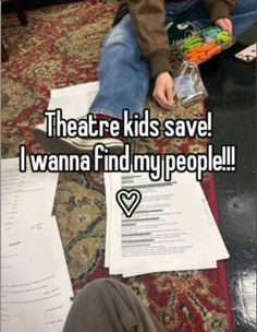 a person sitting on the floor next to some papers with words that read theatre kids save i wanna find my people