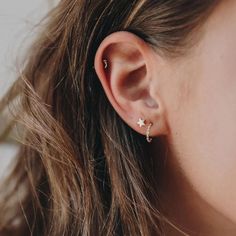 Add a touch of celestial charm to your everyday look with our Star Studs. Made with 18k gold filled materials, these tiny studs are perfect for everyday wear and will elevate any outfit. ∙ D E T A I L S ∙ - 18k Gold Filled- 3.5mm - Lead + Nickel Free∙ G O L D ∙ F I L L E D ∙ Gold-filled components contain 100+ times more real gold than gold-plated components and are both durable and tarnish resistant. It is more affordable and accessible than solid gold but higher quality than gold plated. Ear Piercing Helix, Piercings Lip, Piercings Tragus, Double Cartilage, Tongue Piercings, Piercing Industrial, Piercings Ear, Piercings Cartilage, Double Ear Piercings