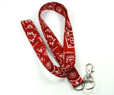 This cute lanyard has beautiful red bandana design. It is perfect for any occasion. You can leave me a convoy if you need a different size. You can have a wardrobe of lanyard to match your outfit. This lanyard is made of soft 100% cotton fabric to give a comfortable feel around your neck. This lanyard is easy to take care. You can spot clean and throw in a washer and hang dry. If you want you can iron and it is ready to use. These lanyards are perfect if you have metal allergy. Each of these lan Cute Lanyard, Cute Lanyards, Fabric Lanyard, Bandana Design, Red Bandana, Have Metal, Badge Holder, Red Fabric, Badge Holders Lanyard