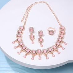 Gold Rodium Polish Pink and Majenta color Necklace in Metal Alloy studded with CZ Diamond Pop Jewelry, Pearl Clasp, Earring Ring, Women's Jewelry Sets, Cz Diamond, Metal Necklaces, Set For Women, Ring Set, Ring Sets