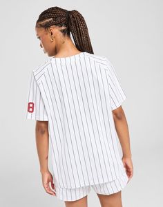 Bring sports-inspired style to your 'fits with this women's Bounce Baseball Jersey from McKenize. Excusive to JD, this relaxed-fit top is made with smooth, lightweight poly fabric for lasting comfort. It features a full-lenth button placket for a custom feel, and short sleeves with dropped shoulders. Finished with an all-over pinstripe pattern and sporty McKenzie branding. Machine washable. | Our model is 5'7" and wears a size small. Pinstripe Pattern, Jd Sports, Baseball Jersey, Baseball Jerseys, Button Placket, Workout Tops, Short Sleeves, Relaxed Fit, Branding