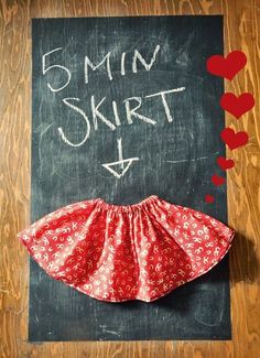 a blackboard with the words 5 min skirt written on it and a red heart