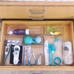 an open drawer filled with lots of different items