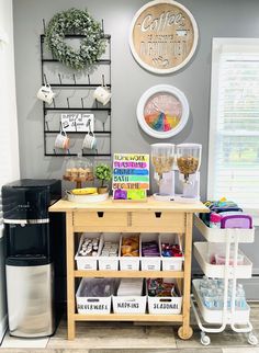 a coffee shop with various items displayed on the counter and shelves above it that are organized