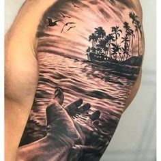 a man's half sleeve tattoo with an image of a boat and birds in the water