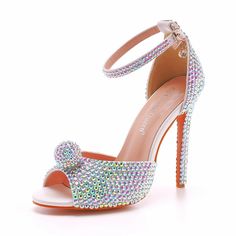 Silver Ankle Strap Heels With Rhinestones For Prom, Cocktail Heels With Rhinestones And Ankle Strap, Ankle Strap Heels With Rhinestones For Events, Crystal Ankle Strap Heels For Evening, Party Heels With Bling And Closed Toe, Glamorous Wedding Shoes With Rhinestones And Ankle Strap, Glamorous Rhinestone Wedding Shoes With Ankle Strap, High Heel Rhinestone Wedding Shoes For Cocktail, Rhinestone High Heel Wedding Shoes For Cocktail