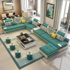 a living room filled with lots of blue furniture