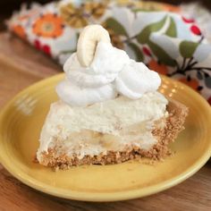 a piece of pie sitting on top of a yellow plate