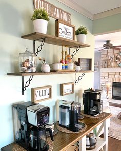 the coffee bar has two shelves on each side and one shelf is filled with various items