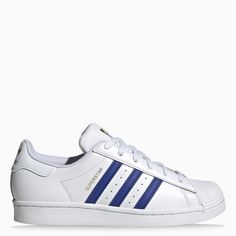 Superstar trainers by adidas Originals in white faux leather with the iconic stripes in blue and gold detailing. Blue Low-top Sneakers With Three Stripes Branding, Blue Low-top Sneakers With Three Stripes, Blue Sneakers With Three Stripes Branding, White Sneakers With Signature Stripes For Streetwear, Blue Sporty Sneakers With Three Stripes, White Low-top Sneakers With Signature Stripes, Adidas Superstar Blue, Alexander Mcqueen Oversized Sneaker, Red Trainers