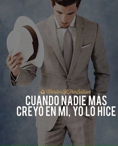 a man in a suit and tie holding a hat with the words quanndo nadie mas creyo en mi, yolohice