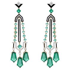 These exquisite earrings are handcrafted in 14-karat gold, 27.16 carats emerald and set in 1.42 carats of sparkling diamonds. FOLLOW MEGHNA JEWELS storefront to view the latest collection & exclusive pieces. Meghna Jewels is proudly rated as a Top Seller on 1stDibs with 5 star customer reviews. All items manufactured by us are handmade and can be customized or redesigned. Certificate available upon request. Composition Gross Weight : 20.930 Gms. Gold Net Weight : 15.053 Gms. Emerald Weight: 27.1 Luxury Green Diamond Earrings, Luxury Emerald Earrings With Diamond Accents, Luxury Green Diamond Earrings With Accents, Luxury Green Emerald Diamond Earrings, Green Diamond Earrings For Evening, Luxury Green Hand-set Earrings, Luxury Hand-set Emerald Earrings, Movie Jewelry, 3 Earrings