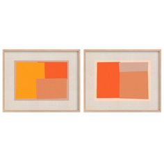 two framed art pieces with oranges and browns