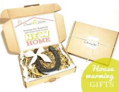 the new home gift box is open and has scissors in it