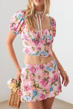 🖤 Get ready to bloom in this Floral Bustier Puff Sleeve Crop Top & Mini Skirt Set. With its playful puff sleeves and flattering silhouette, this set is perfect for any occasion. Featuring a stunning floral print, you'll stand out in any crowd. So go ahead, embrace your inner flower child and rock this unique and stylish set! 🖤 Item Feature: women summer set, floral, crop length, mini skirt, puff shirt sleeve, sweetheart neckline, ruched bust, bustier-style bodice, spring-summer, boho style, cute, girly, romantic,dress, a must have! 100% Rayon Lining: 100% Rayon Size & Fit Skirt Length: 28", Waist: 28"- For Size Small True to size Size Chart Model is 5'9" (Bust: 34B, Waist: 26", Hips: 36"). Model is wearing size S.st: 24", Hips: 34"). Model is wearing size S. Puff Shirt, Crop Top Mini Skirt, Floral Puff Sleeve Top, Floral Bustier, Mini Skirt Set, Puff Sleeve Crop Top, Formal Cocktail Dress, Summer Boho, Summer Set