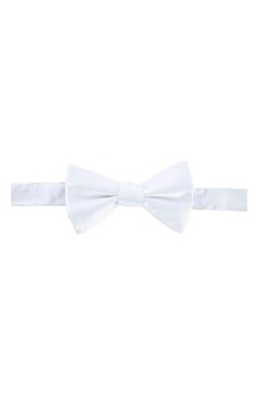 A solid hue ensures this silk bow tie will be a staple for years to come. 100% silk Dry clean Imported Classic Pre-tied Satin Bow Tie, Classic Pre-tied Bow With Ties, Classic Pre-tied Decorative Bow, Classic Pre-tied Bow, Elegant White Bow Tie For Black-tie Events, Classic Solid Color Bow With Ties, Classic Solid Suit And Tie Accessories With Decorative Bow, Classic Pre-tied Tie With Decorative Bow, White Bow Tie For Formal Occasions