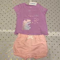 Carter’s Baby Girl Graphic T-Shirt & Shorts Set Size: 12m Cute Purple T-Shirt With Glittery Graphic Of Dinosaur Blowing Bubbles And The Words “Love Is Magical” On The Front. Pretty Pink Pull On Shorts With Elastic Waist And Bow Detail On Front. 2 Pieces - Includes T-Shirt & Shorts All Items Made Of 100% Cotton Exclusive Of Decorations Cute Short Sleeve Purple Set, Purple Cotton Playwear Sets, Cute Purple Cotton Sets, Pink Pull, Christmas Skirt, Baby Boy Clothes Newborn, Pull On Shorts, Plaid Outfits, Stripe Outfits