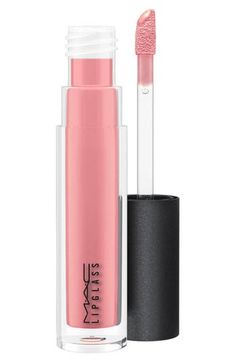 What it is: A lip gloss available in a wide range of colors that conditions your lips with a glass-like finish.What it does: Designed to be worn on its own, over your lip pencil or over your lipstick, this smoothing gloss is perfect for creating a shine that lasts. It can impart subtle or dramatic color onto your lips and contains jojoba oil to help soften and condition. How to use: Prep your lips with a primer prior to application. Apply to lips using the doe-foot applicator. For a fuller look, Mac Lipgloss, Apply Lip Gloss, Mac Lipglass, Chic Over 50, Lip Primer, Nude Makeup, Apricot Kernel Oil, Diy Kits Gift, Lip Pencil