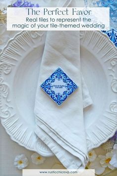 a white plate topped with a blue and white napkin