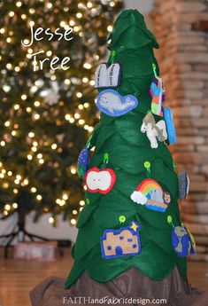 a christmas tree made out of felt with the words jesse tree on it