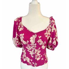 Elevate Your Wardrobe With This Stunning Sienna Sky Blouse In A Beautiful Shade Of Pink. The Blouse Features A Floral Pattern And Is Designed With An Off-The-Shoulder Neckline That Is Perfect For Any Occasion. The Blouse Has A Snap Closure And Is Made Of High-Quality Polyester Material That Is Comfortable To Wear. The Sleeveless Design And Cropped Style Give It A Trendy And Fashionable Look. The Blouse Has Ruffle Detailing That Adds A Touch Of Elegance To It. It Fits True To Size And Is Ideal Fo Fitted Puff Sleeve Blouse For Vacation, Cropped Style, Workout Clothes, Off Shoulder, Blouses For Women, Womens Sizes, Crop Tops, Womens Tops, Wardrobe