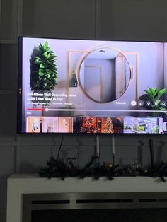 a flat screen tv mounted to the side of a wall