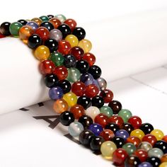 Check out our Coupon Codes Below! Material: Multi-color Agate Shape:  Smooth Round Color:  Multi-Color Size: 6mm  - Approx 67 Beads Per Strand 8mm -  Approx 50 Beads Per Strand 10mm -  Approx 39 Beads Per Strand Hole Size: 1.2mm The Multi-Color Agate Mined in Northeast,China Note: -Gemstone bead sizes are approximate and may have a +/- 0.5mm difference.   -Gemstone bead drill hole sizes are approximate and may have a +/- 0.2mm difference. Use our Coupon Codes for Big Savings! 10% off when you sp Bead Sizes, Diy Gemstone, Gem Show, Sewing Stores, Diy Beads, Post Office, Jewelry Making Beads, Round Beads, Coupon Codes