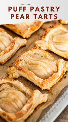 salted caramel pear tarts on a baking sheet with text overlay that reads salted caramel pear tarts