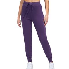 New With Tags Attached The Jack Jogger In Purple Size Small 14 Inches Across The Waistband 28 Inch Inseam Purple, High Waisted Banded Cuffs Drawstring, Elastic Wide Waistband Purple Athleisure Sweatpants With Elastic Waistband, Casual Purple Joggers For Loungewear, Sporty Purple Loungewear Bottoms, Purple Cotton Athleisure Pants, Purple Full Length Loungewear Pants, Purple Sweatpants With Elastic Waistband, Purple Athleisure Joggers For Loungewear, Purple Athleisure Bottoms For Loungewear, Purple Athleisure Sweatpants For Loungewear